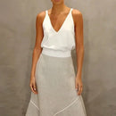 Conjunto Blusa com Decote em V e Saia Evasê Assimétrica Fellinne